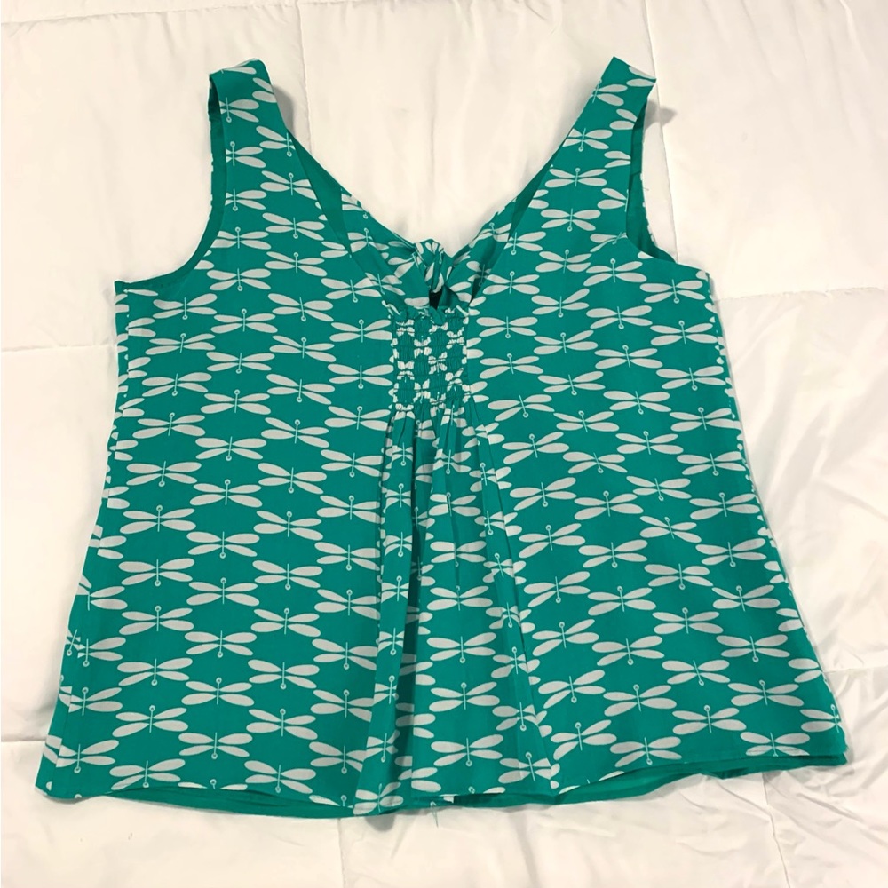 Green and white top.